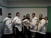 A Group of Inuit Women in Traditional Amautit - Women's Parkas